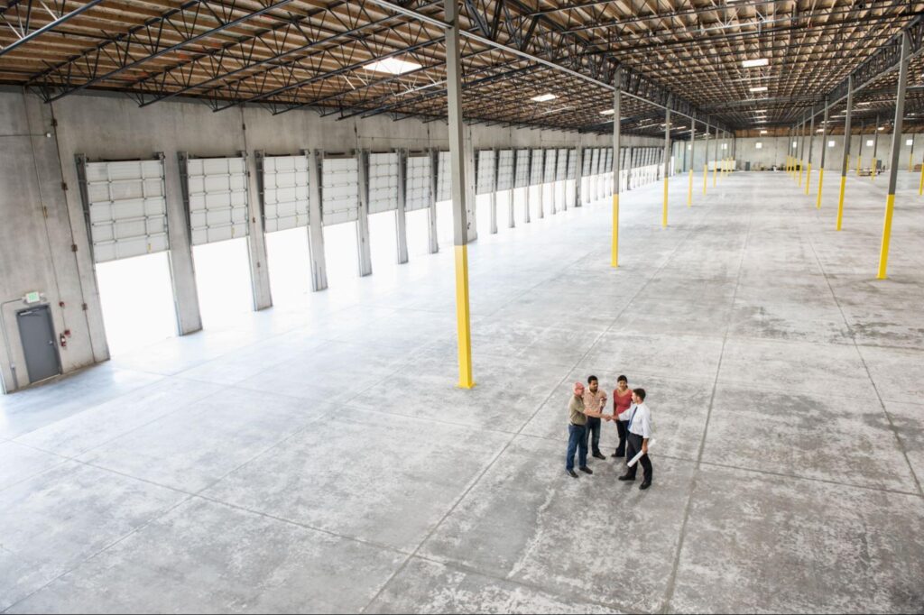 warehouse with people talking inside